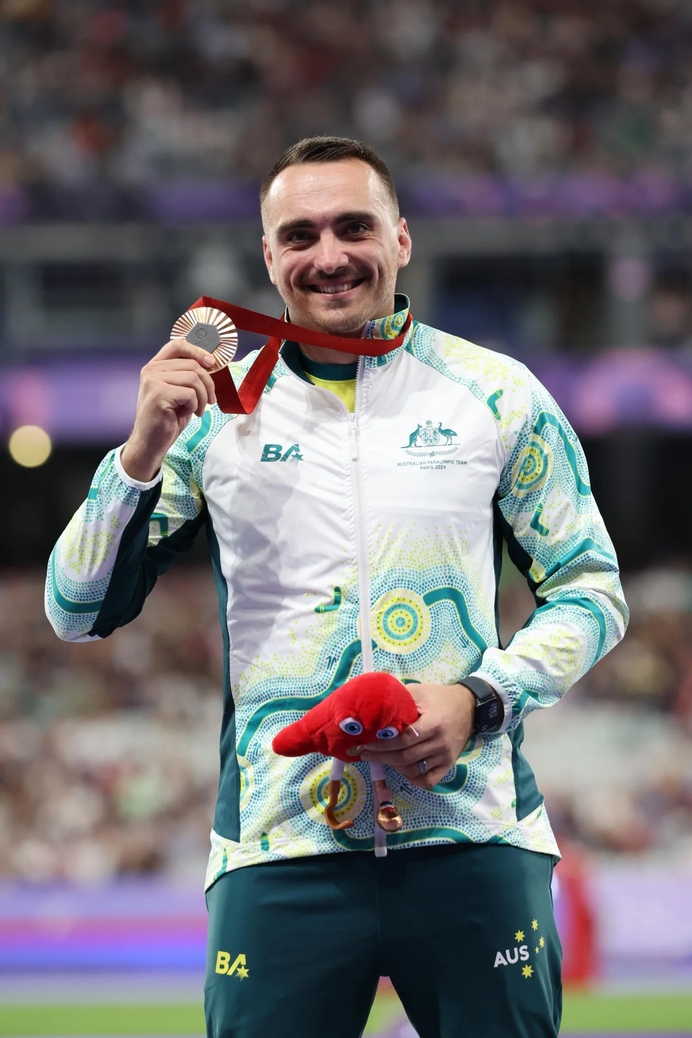 Michal Burian with Paralympic medal